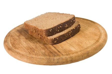 Two slices of brown bread on a wooden plate (isolated on white)