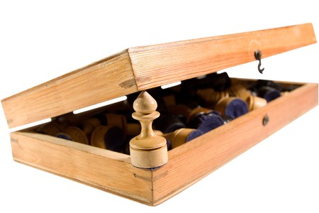 Old half-open wooden chessboard with a pawn and other chess figures inside (isolated on white)