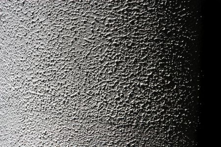 Rough plaster background with dark edgesの写真素材