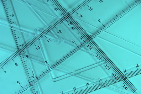 Transparent rulers against a blue background (as an abstract mathematical background)の写真素材