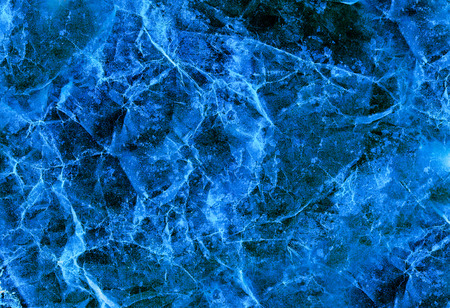 Dark blue abstract background resembling old marbleの写真素材