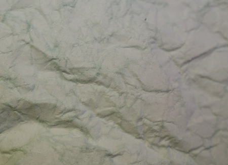 Crumpled gray paper (as a paper background or paper texture)の写真素材