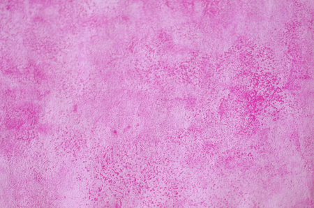 Slightly blurred light pink paper (as a paper background or abstract pink background)の写真素材