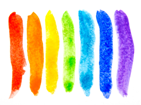 Bright watercolor brush strokes of rainbow colors (isolated on white)の写真素材