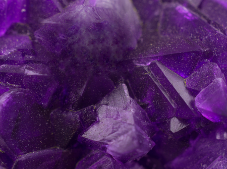 Macro shot of a magic purple crystal (very shallow DOF, selective focus) as an abstract backgroundの写真素材