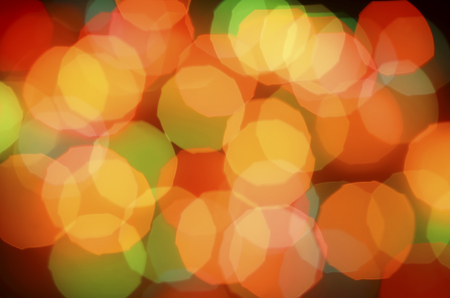 Colorful red yellow blue blurred abstract pattern made of circle light balls. Photo background.の写真素材