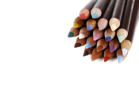 Color pencils with space for text, white background. Texture wood colored pencils. Colored pencils macro. DOF.の写真素材