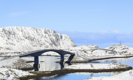 famous fredvang bridges in winter with mountains in backgrond, lofoten islands, norwayの写真素材