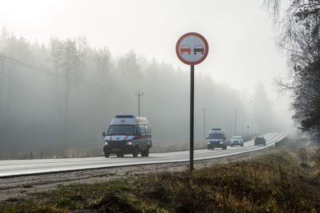 Ambulance rides in poor weather conditions to help. Russiaのeditorial素材