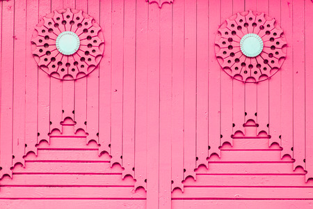 pink wooden house with patterns of of boards. Vintage backgroundの写真素材