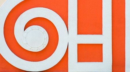 Elements of the exterior architecture, spiral and straight white lines on an orange background.の写真素材