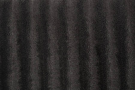 Highly detailed texture of black velour cloth with animal skin patterns