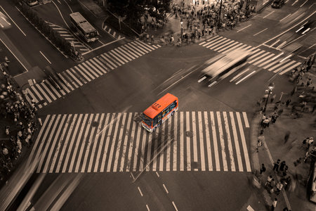 Aerial view of the Shibuya Crossing Intersection in front of Shibuya Station with Hachiko Community Bus stop in center.のeditorial素材