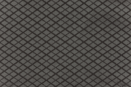 Highly detailed all over background texture of black and gray diamond-shaped stripes textile in synthetic fabric.の写真素材