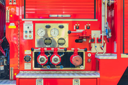 View of the control station of the water pressure valves of a Japanese fire truck.のeditorial素材