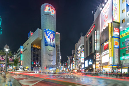 TOKYO, JAPAN - AUGUST 21, 2018: Futuristic architecture with mirroring swiveling panels in Shibuya...