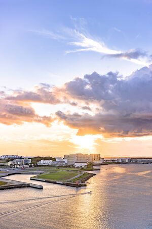 Sunset over the sea in Sumiyoshi-cho, Naha, Okinawa from the  Hotelの写真素材