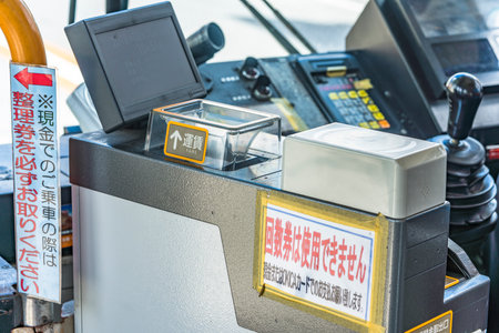 Nakagusuku, Japan - September 16, 2018: Ticket machine and payment machine Naha city non-step bus in...