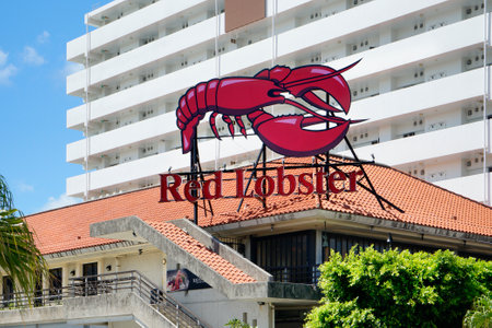Okinawa, Japan - September 14, 2018: American shop sign where is inscribed Red Lobster in the shop mall of the American village of Chatan City in Okinawa where Seaside Distortion, Oak Fashion and Seaside Island Depot are locatedのeditorial素材