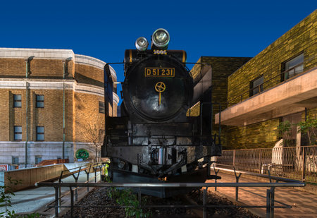 tokyo, japan - january 07 2020: Real coal train at the entrance of the National Museum of Nature and...