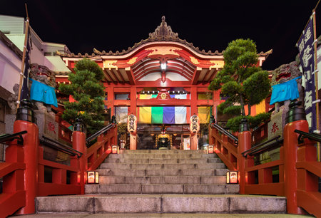 tokyo, japan - january 02 2020: Buddhist Tokudaiji temple in the Ameyoko street of Tokyo at night.のeditorial素材