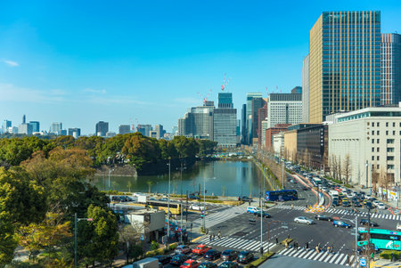 tokyo, japan - march 25 2020: Car traffic at crossing intersection of Hibiya Street and Harumi...