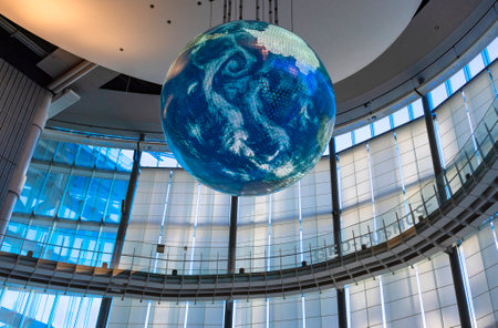 Tokyo, Japan - March 01 2020: Low angle view of the earth globe display named Geo Cosmos in the atrium of the Miraikan or National Museum of Emerging Science and Innovation at Odaiba in Tokyo.のeditorial素材