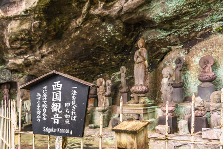 chiba, japan - july 18 2020: Buddhist statues of Saigoku Kannon bodhisattva created in 18th century by Jingoro Eirei Ono in the Mount Nokogiri with the Song of Freedom by the zen monk YÅka Genkaku.のeditorial素材
