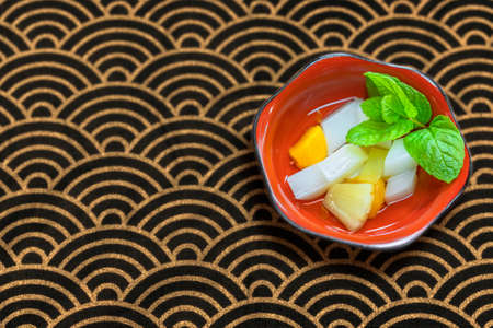 Japanese traditional dessert of Annin tofu or almond tofu made of apricot kernel milk, agar, and...
