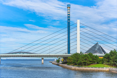 yokohama, japan - july 19 2020: ShibakÅrokyÅ bridge leading to the amusement park of Yokohama Hakkeijima Sea Paradise with Marin gate, the blue fall and the aqua museum in background.のeditorial素材