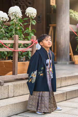 asakusa, japan - november 02 2019: Five-year-old Japanese child boy wearing a luxury hakama kimono for the traditional rite of passage named Shichi-Go-San to celebrate his growth and well-being.のeditorial素材