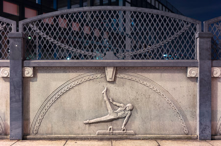 tokyo, japan - november 02 2019: Close up on a stone relief depicting an athlete practicing pommel horse on the Olympic Bridge of Harajuku named Gorinbashi and created for the 1964 Summer Olympics.のeditorial素材