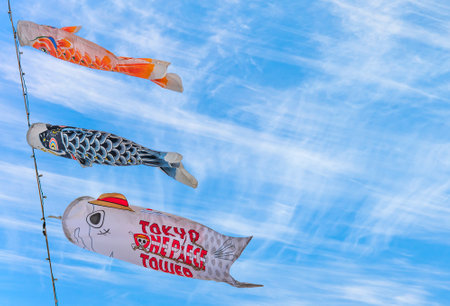 tokyo, japan - May 05 2021: Close up on Japanese Koinobori or carp streamers on the Tokyo Tower and...