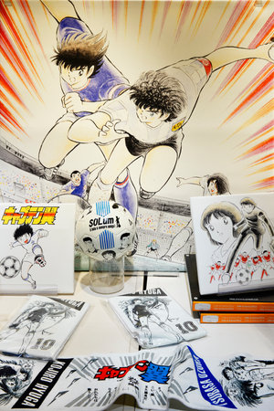tokyo, japan - may 04 2018: Entertainment products dedicated to the sport manga Captain Tsubasa by Japanese artist yoichi takahashi with towels, art panels or soccer ball in a fashion store of skytreeのeditorial素材
