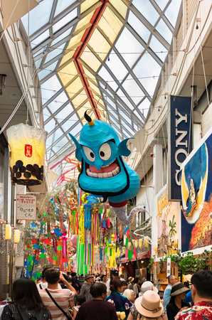 tokyo, japan - august 5 2019: Mashed paper sculptures of the Genie of Aladdin released from a lamp and a Bubble tea in the Asagaya Pearl Center shopping street indoor mall during Tanabata festival.のeditorial素材