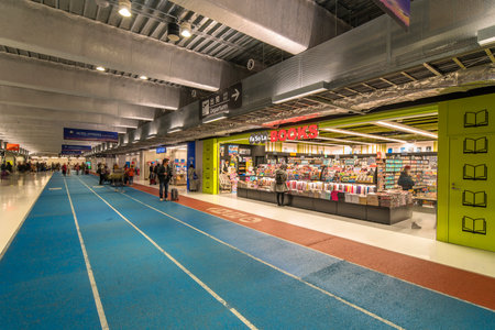 tokyo, japan - december 06 2019: Books store in the domestic terminal 3 of Narita International Airport designed as an indoor running track in a color-coded circuitのeditorial素材
