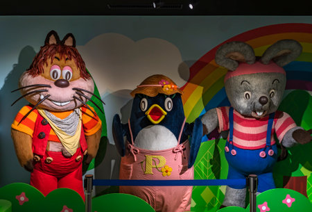 tokyo, japan - july 18 2021: Large puppet costumes of the anthropomorphic wildcat Jajamaru, penguin Piccolo and mouse Porori of Niko Niko Pun show in NHK children's television program Okaasan to Isshoのeditorial素材