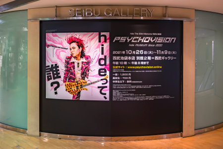 tokyo, japan - october 27 2021: Poster of the exhibition Psychovision dedicated to The 23rd Memorial of Hide, the famous 90 'visual rock singer and member of X Japan in the Seibu Gallery of Ikebukuro.のeditorial素材