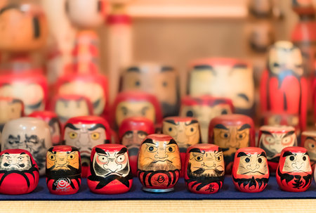 tokyo, japan - October 14 2021: Large amount of wooden Buddhist bodhidharma or daruma dolls hand painted from all around of Japanese regions in the exhibit free space of the Koganji temple of Sugamo.のeditorial素材
