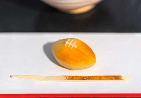 Rugby ball shaped Japanese confection called wagashi or namagashi filled with autumn chestnuts...