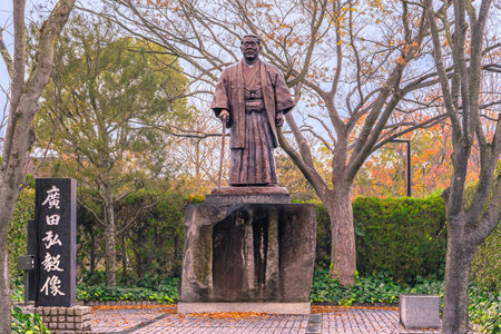 fukuoka, kyushu - april 09 2021: Statue erected by Idemitsu petroleum company in Åhori park depicting ancient Japanese Prime Minister executed for war crimes committed during 2nd Sino-Japanese War.のeditorial素材
