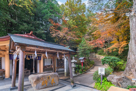 kyushu, japan - december 08 2021: Japanese Shinto censer of Fudo Jinja shrine part of one of the eight Okunomiya Hassha shrines in Miyajidake Shrine in Fukuoka during the momiji season in autumn.のeditorial素材