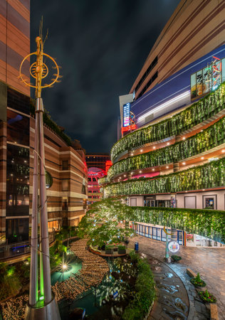 fukuoka, kyushu - december 06 2021:Night view of the multifunctional complex facility called Canal City Hakata mall depicting a waterway illuminated with shiny garlands decorations for christmas.のeditorial素材