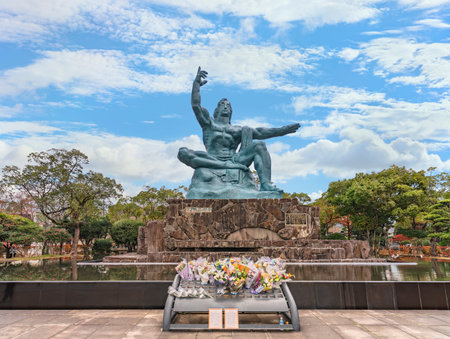 nagasaki, kyushu - dec 11 2022: The Peace Statue of Seibo Kitamura in Nagasaki Peace Park depicting a Japanese man reminder of the consequences of nuclear warfare and calling for nuclear disarmament.のeditorial素材