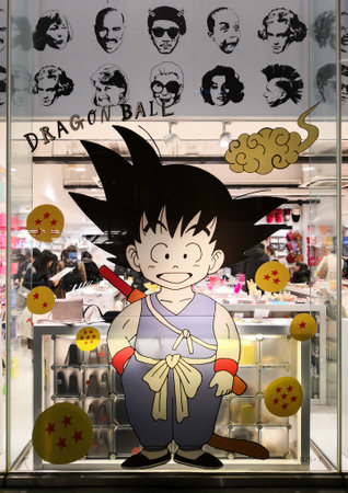 tokyo, japan - dec 15 2018: The Japanese anime and manga child character Son Goku depicted on a giant sticker on a show window of the Asoko shop of Harajuku during a collaboration with Dragon Ball.のeditorial素材