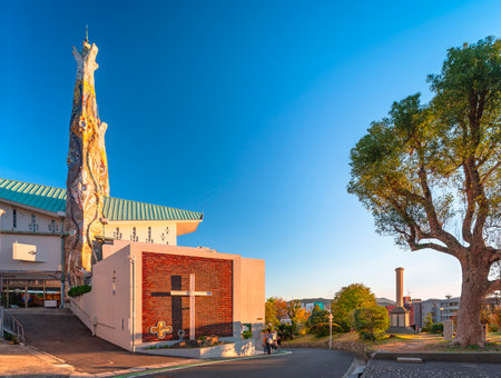 Nagasaki, Kyushu - Dec 11 2022: Sunset over St Filippo Nishizaka Church whose towers were created in 1962 by Japanese architect Kenji Imai who was inspired by Antonio or Antoni Gaudi's Sagrada Familiaのeditorial素材