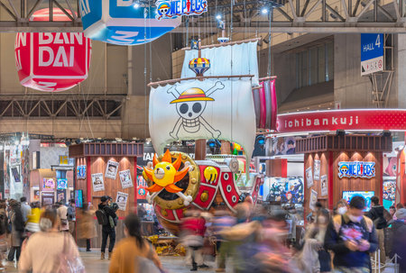 chiba, japan - dec 18 2022: Giant inflatable sculpture featuring the Thousand Sunny brigantine-type ship from the Japanese manga and anime series One Piece overlooking the Jump Festa convention.のeditorial素材