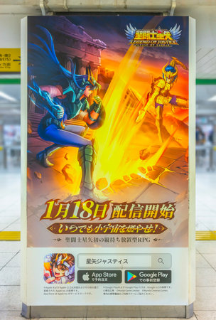 tokyo, japan - jan 16 2024: Mobile phone RPG game 'Legend of Justice' poster tribute to Japanese manga and anime 'Knights of the Zodiac: Saint Seiya' showcasing Dragon Shiryu and Capricorn Shura.のeditorial素材