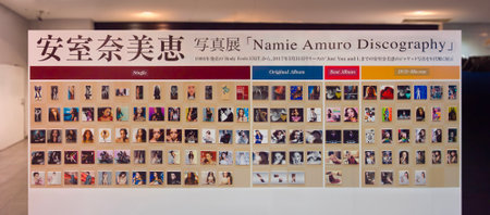 tokyo, japan - nov 11 2017: Wall featuring a complete discography of albums, singles, DVDs and Blu-rays released from 1992 to 2017 by retired singer Namie Amuro, known as the "Queen of Japanese Pop".のeditorial素材