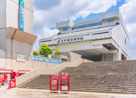 ryogoku, tokyo, japan - jun 07 2024: Outdoor view of the Edo-Tokyo Museum entrance featuring prominent signage and a wide stairway leading to the main building under a clear sky with scattered clouds.のeditorial素材